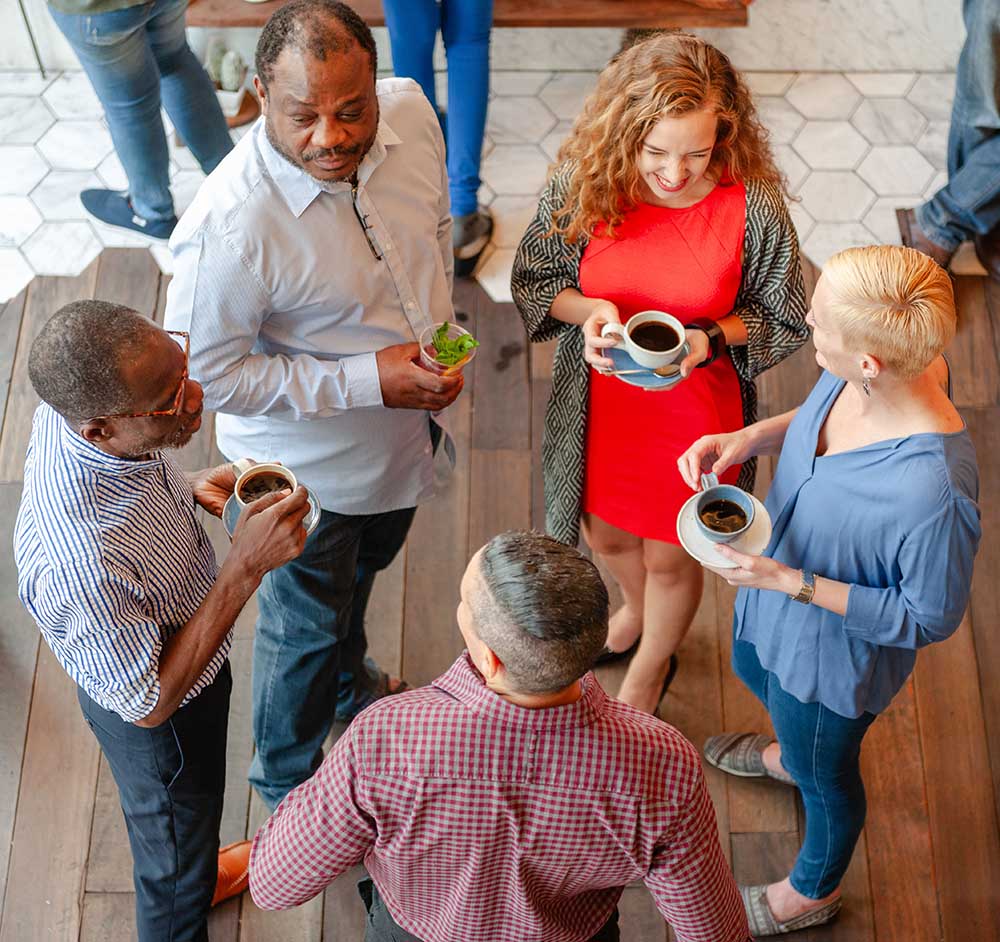 People networking in a coffee break at an event